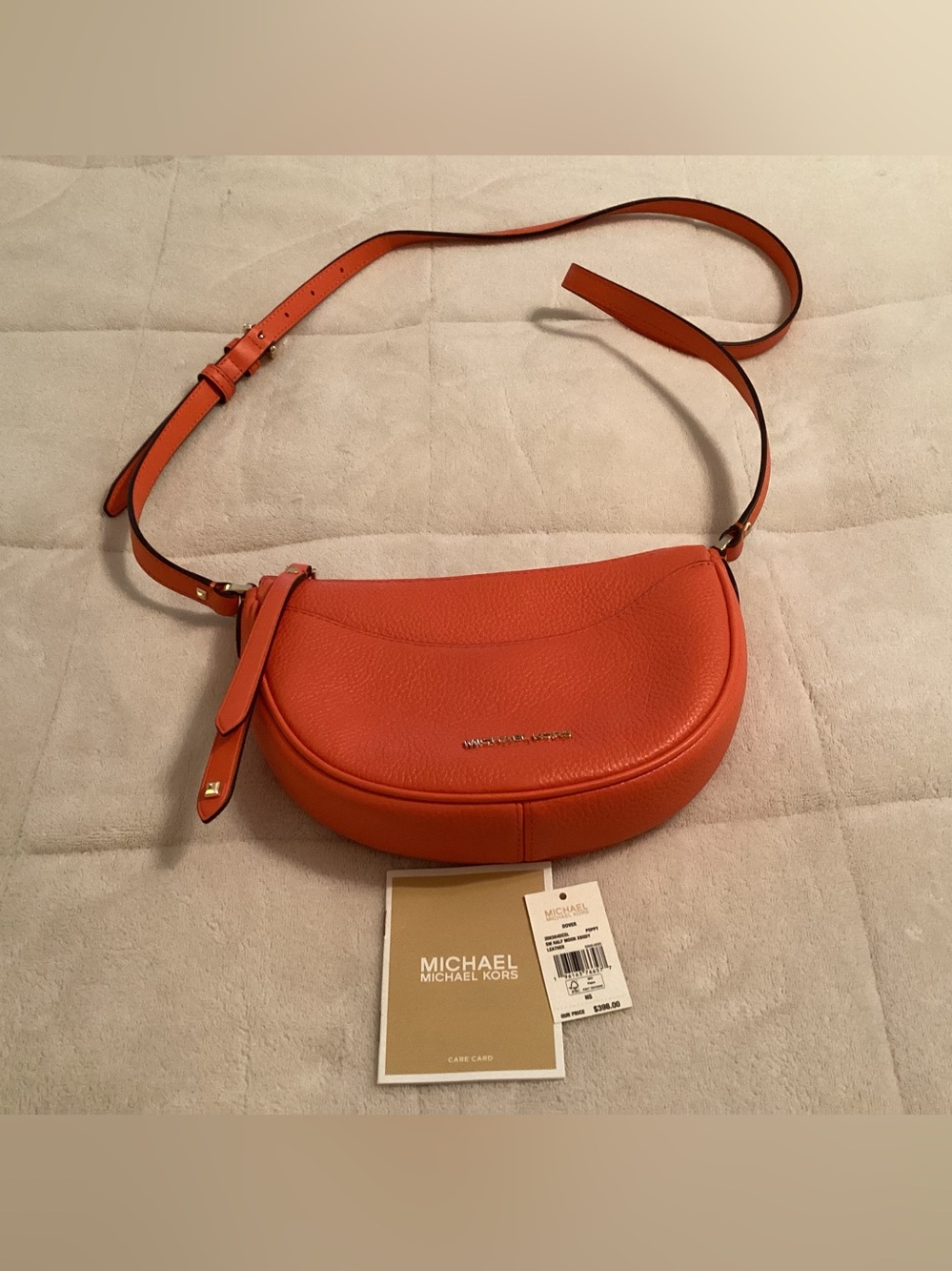 Michael Kors Dover Small pebbled leather crossbody bag.
